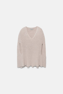 Poncho a coste con scollo a V