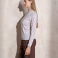 Maglione in maglia con collo alto e volant
