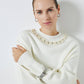 Maglione con collo di perle