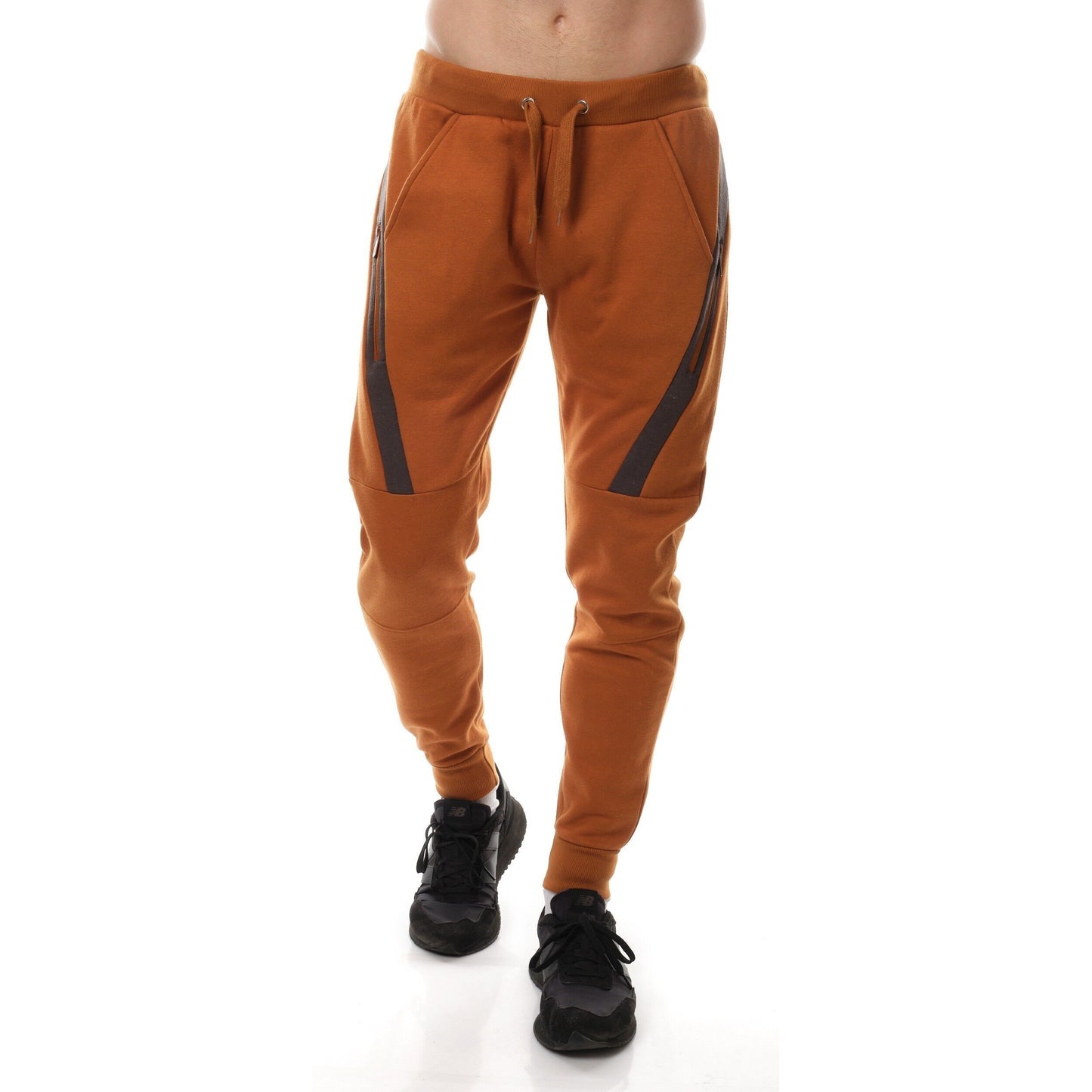 Pantaloni jogger in pile bicolor nero e beige da uomo