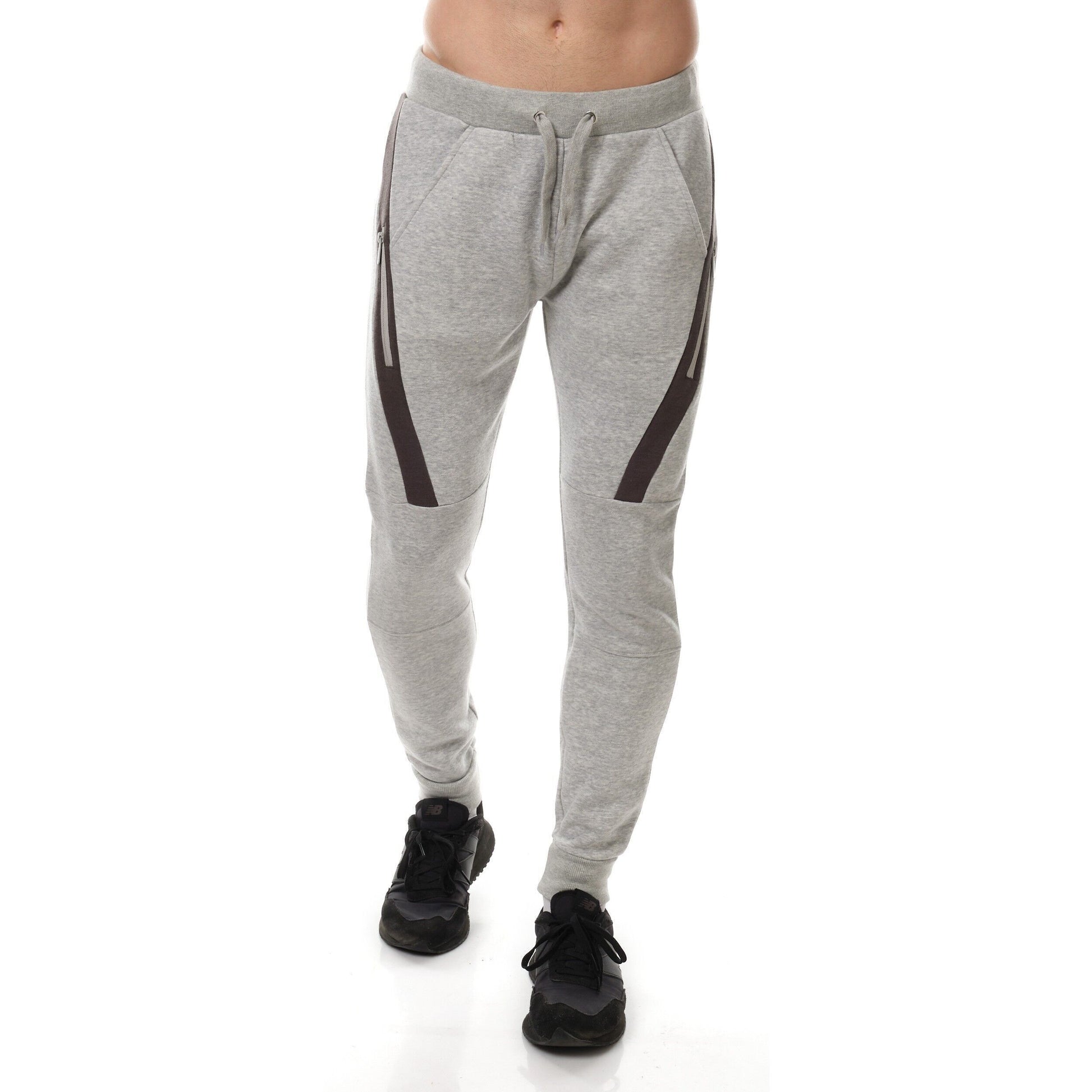 Pantaloni jogger in felpa uomo bicolore con tasche zip
