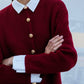 Cardigan lungo bordeaux con bottoni dorati