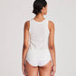 Top in cotone biologico con dettagli in pizzo