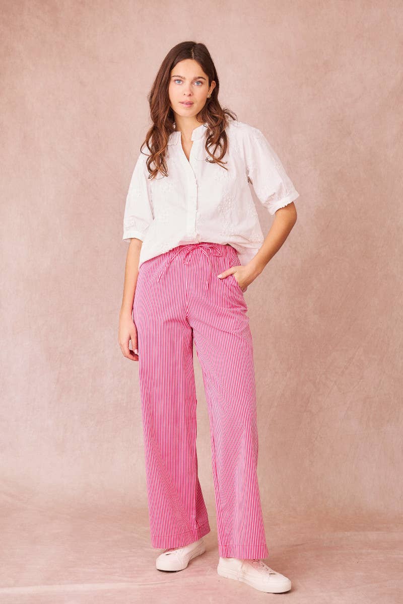 Pantaloni a righe rosa e bianche in cotone a gamba larga