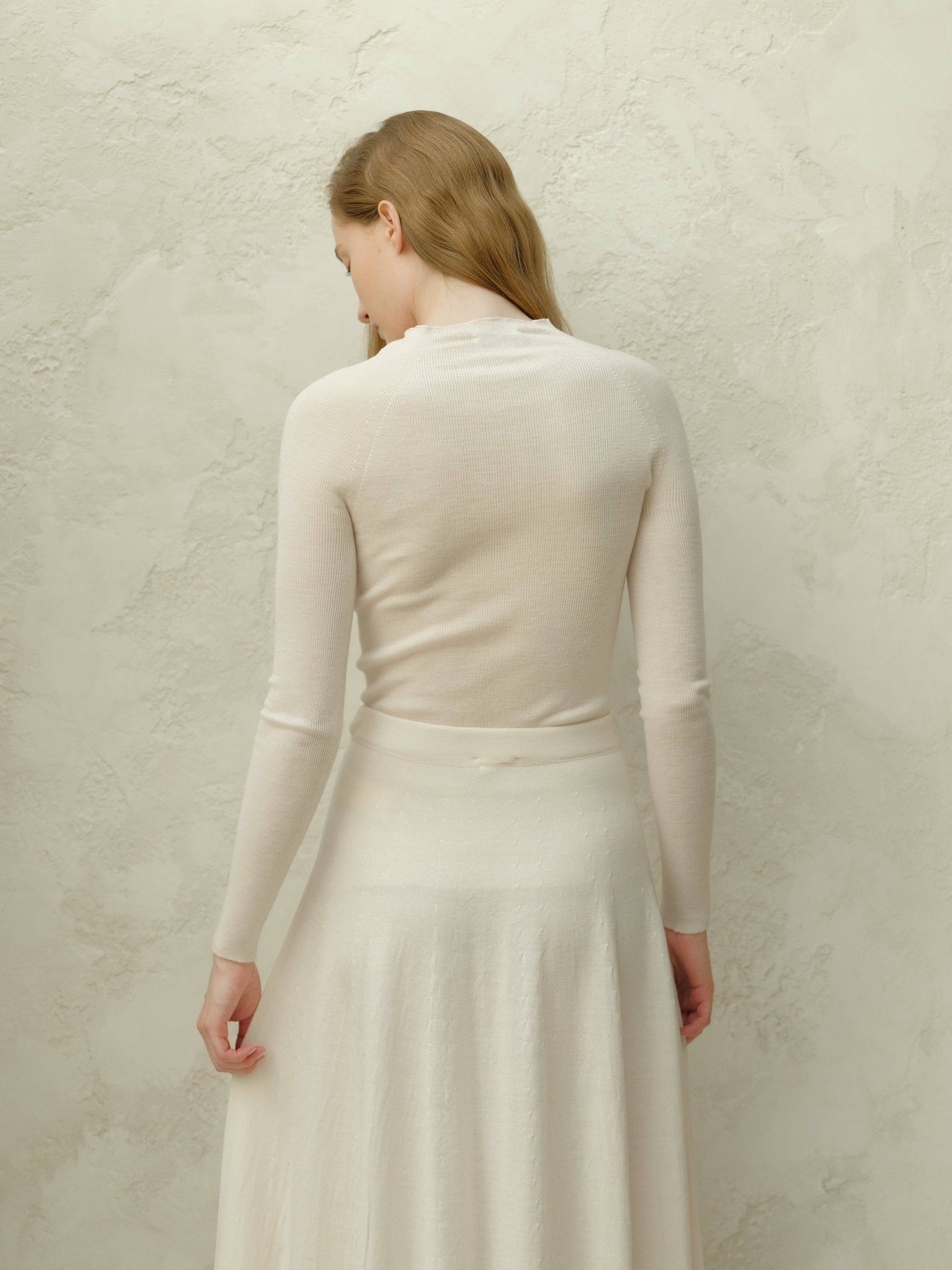 Maglione girocollo a costine in lana merino extra fine 3D