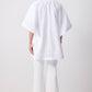 Poncho in cupro bianco con bottoni dorati