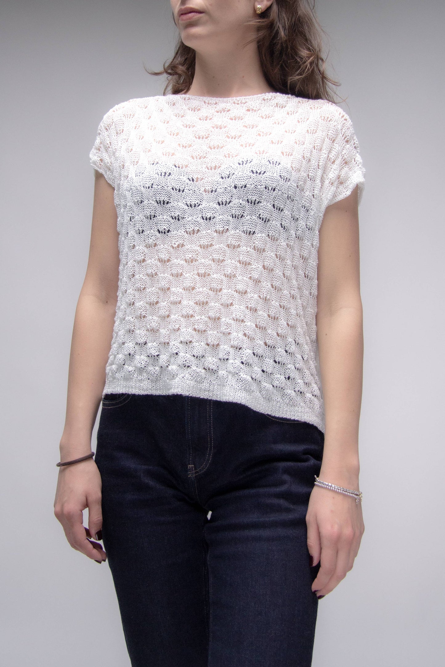 Top corto in crochet traforato dal fit ampio