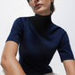 Maglione dolcevita a maglia rasata con maniche 3/4