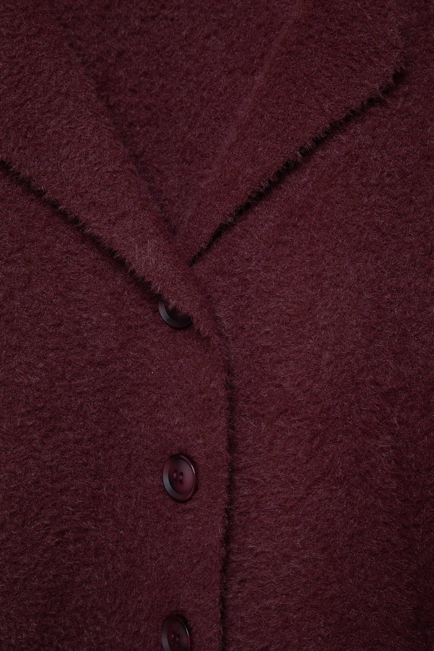 Cappotto corto in pelliccia sintetica bordeaux