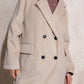 Cappotto midi doppiopetto con revers ampio