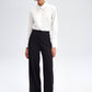 Pantaloni palazzo neri in crepe con piping a contrasto