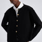 Cardigan corto nero con bottoni dorati