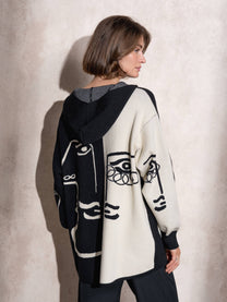 Cappotto cardigan in maglia con cappuccio e zip bicolor con stampa grafica