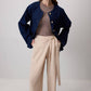 Pantaloni beige a gamba larga con cintura avvolgente