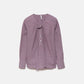 Blusa a quadretti con fiocco e bottoni a contrasto