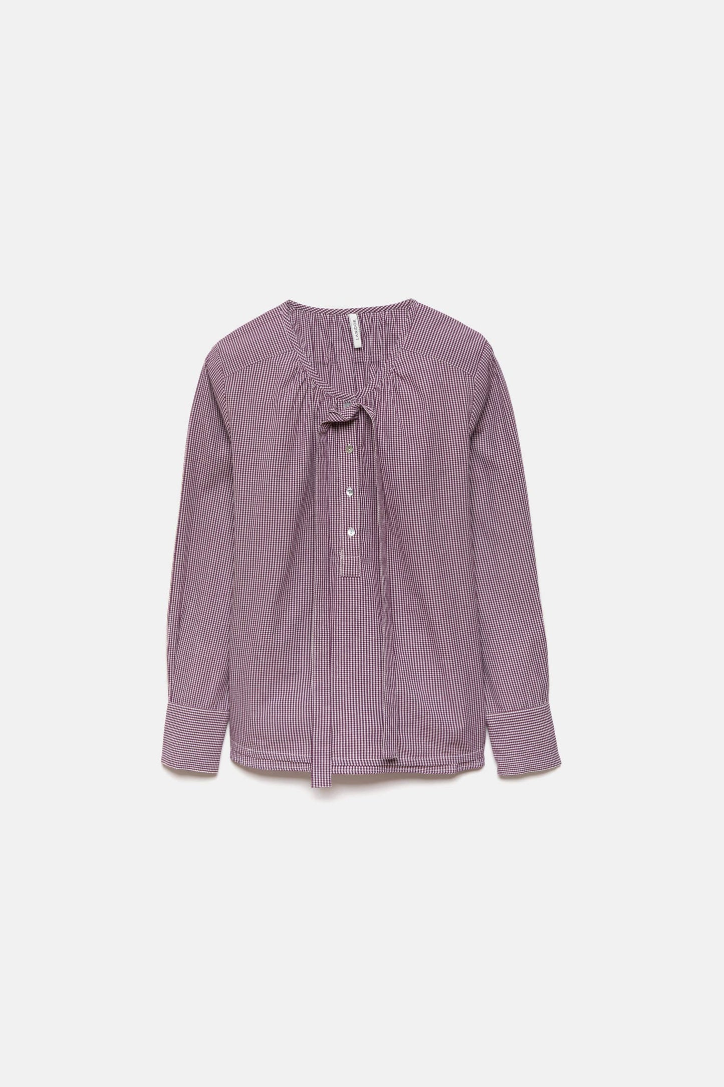 Blusa a quadretti con fiocco e bottoni a contrasto