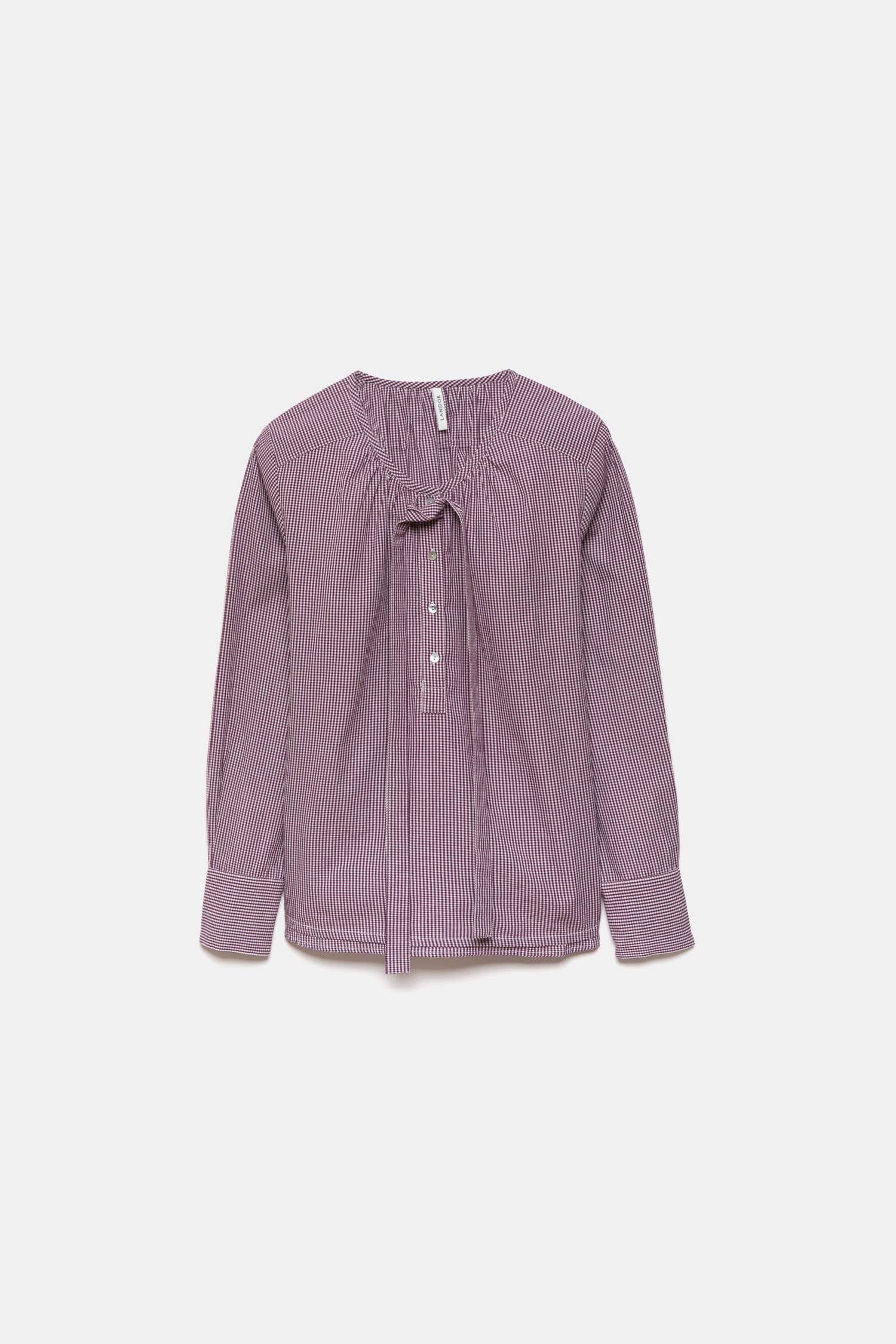 Blusa a quadretti con fiocco e bottoni a contrasto