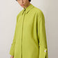 Camicia in popeline verde con polsini ampi