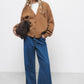 Cardigan in lana a maglia rasata con scollo a V