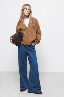 Cardigan in lana a maglia rasata con scollo a V