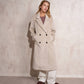 Cappotto lungo doppiopetto con revers