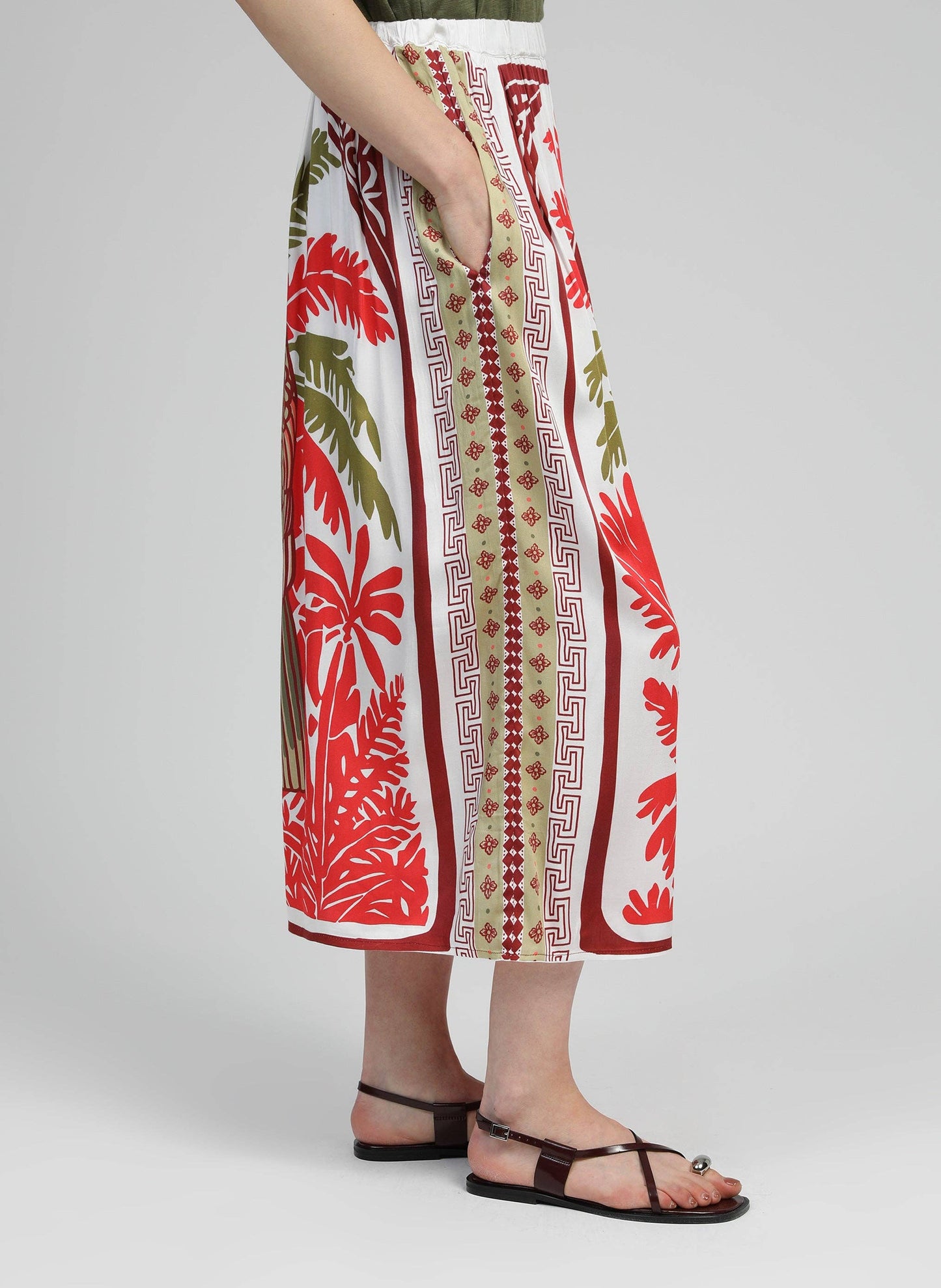 Gonna midi a vita alta con stampa pappagallo rossa