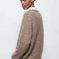 Maglione in lana a trecce