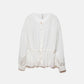 Blusa bianca con coulisse in vita