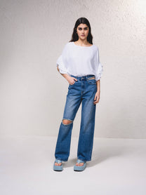 Jeans a vita alta wide leg con strass e strappi