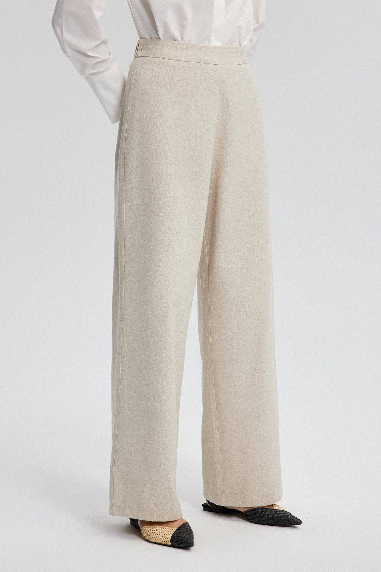 Pantaloni sartoriali in lino crema a gamba larga