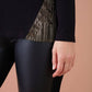 Maglia nera con inserti plissé laminati