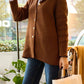 Cardigan lungo marrone con bottoni dorati