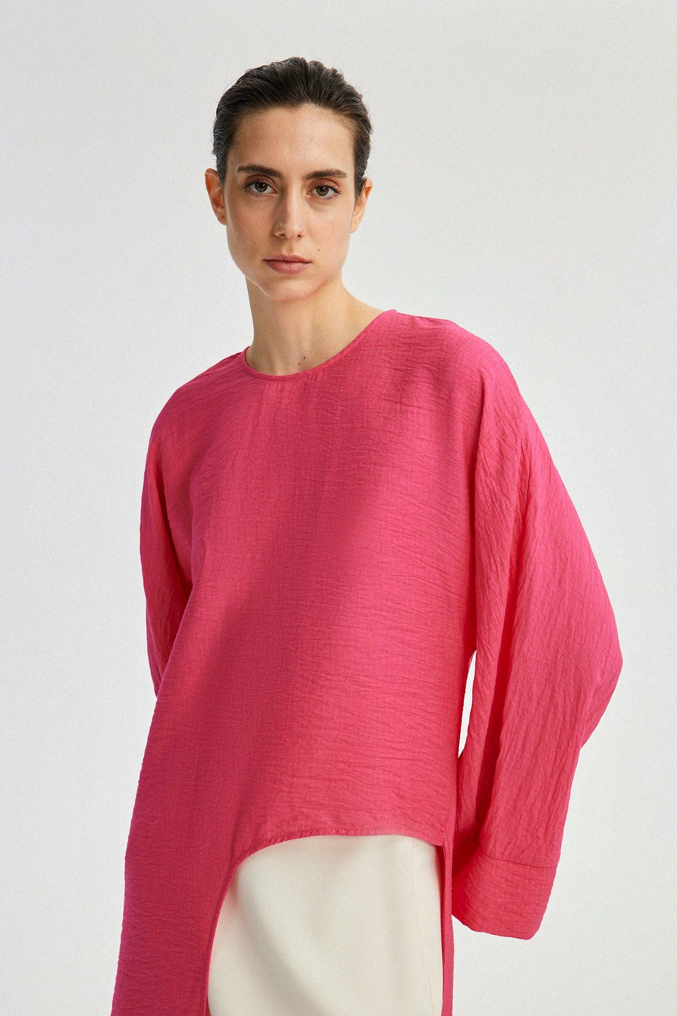 Tunica lunga con spacco frontale fucsia