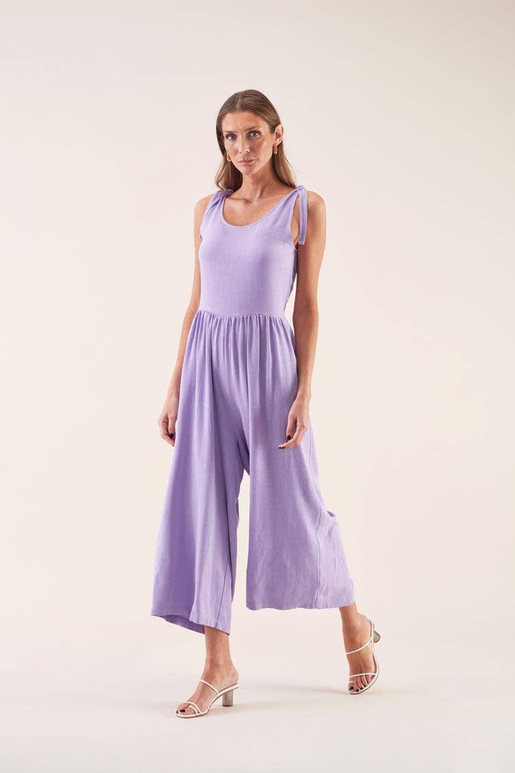 Tuta in cotone e lino lilla con spalline annodate