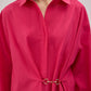 Camicia in popeline fucsia con accessori in metallo