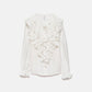 Blusa bianca con volant e laccio al collo