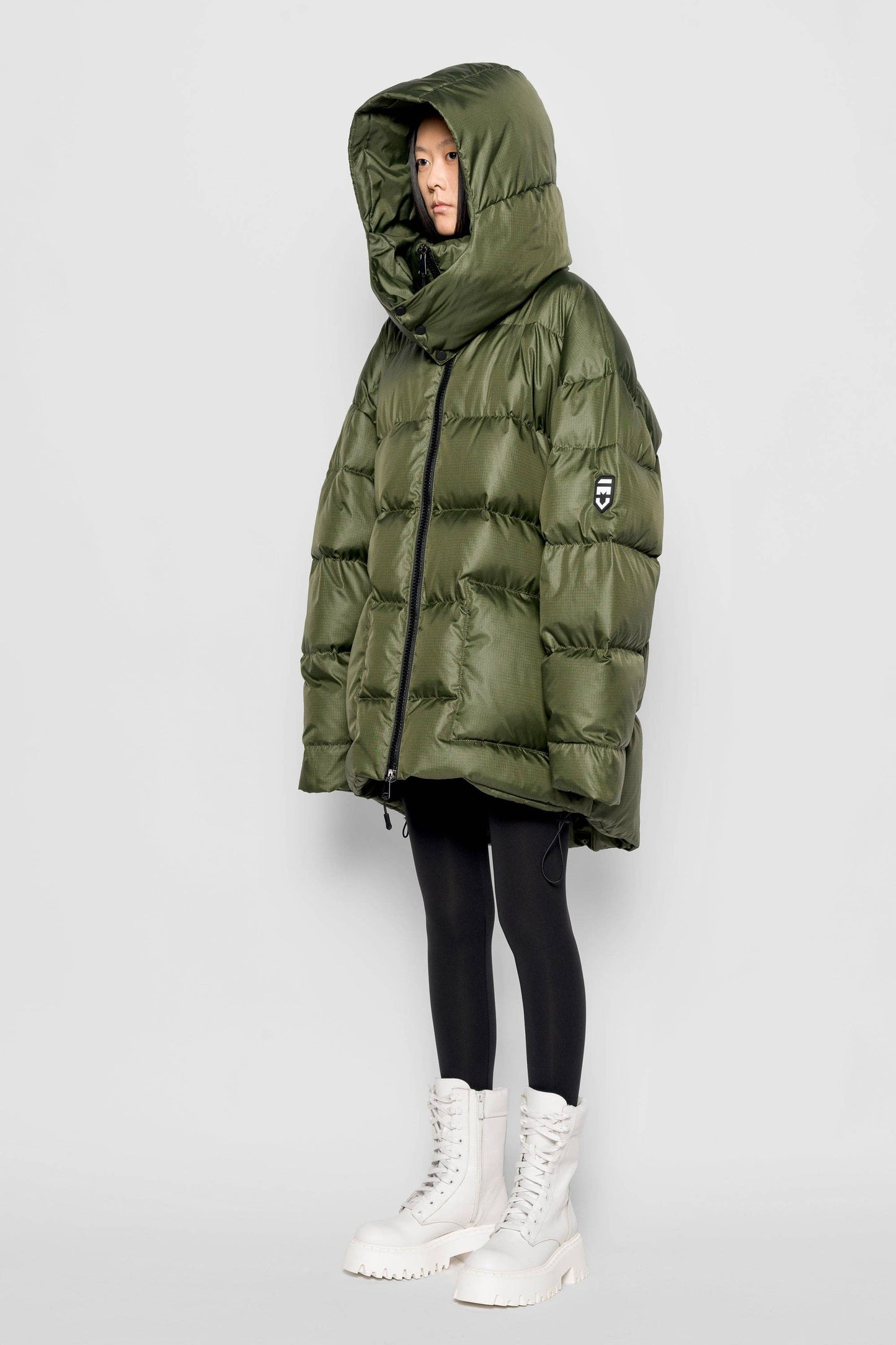 Piumino Iconica verde militare con cappuccio removibile