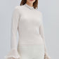 Blusa in maglia ecrù con maniche a balze in chiffon