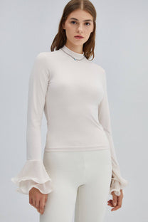 Blusa in maglia ecrù con maniche a balze in chiffon