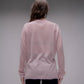 Maglione corto in maglia 3D con scollo a V asimmetrico e spacchi laterali