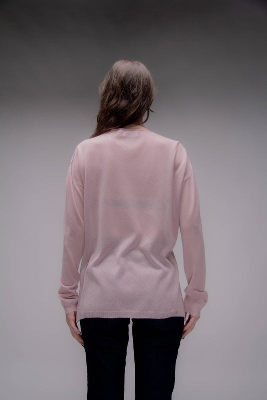 Maglione corto in maglia 3D con scollo a V asimmetrico e spacchi laterali