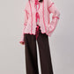 Cardigan in maglia con cintura a contrasto