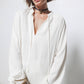 Blusa con coulisse e scollo arricciato
