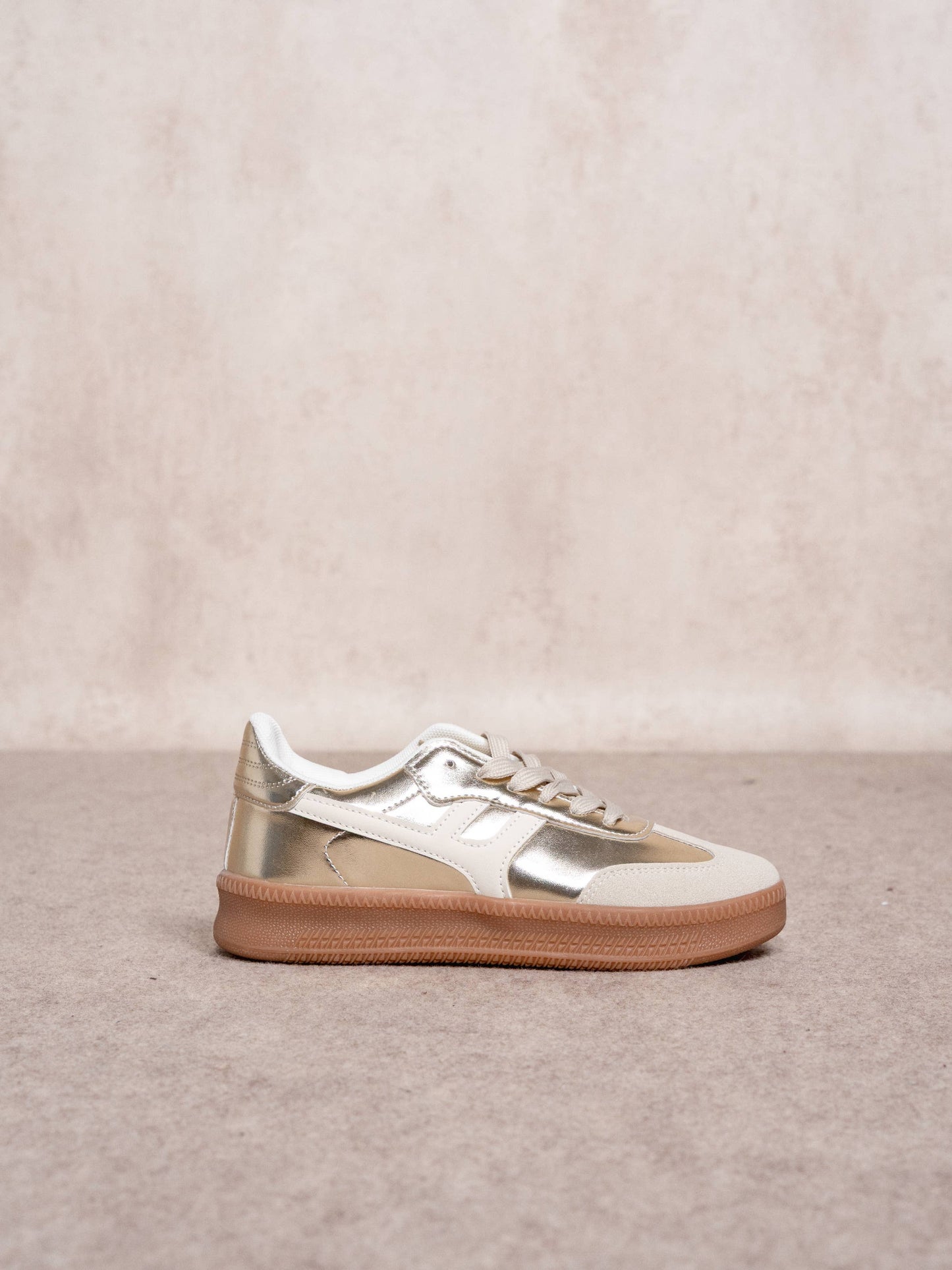 Sneakers donna metallizzate oro con suola in gomma