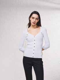 Cardigan in maglia a coste con catene dorate