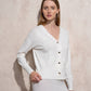 Set in maglia fine con cardigan e gonna ricamata