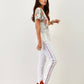 Pantaloni skinny bianchi con banda laterale