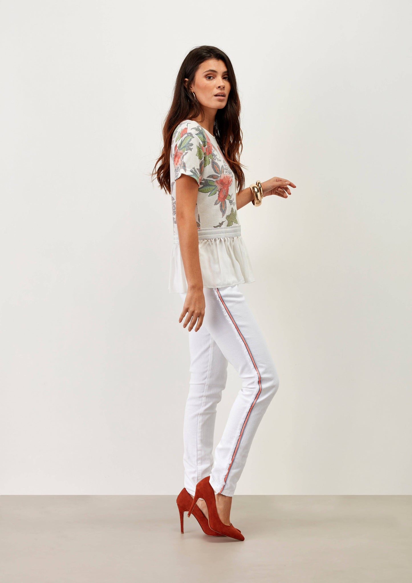 Pantaloni skinny bianchi con banda laterale