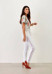 Pantaloni skinny bianchi con banda laterale