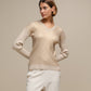 Maglione donna laminato a costine con scollo a V